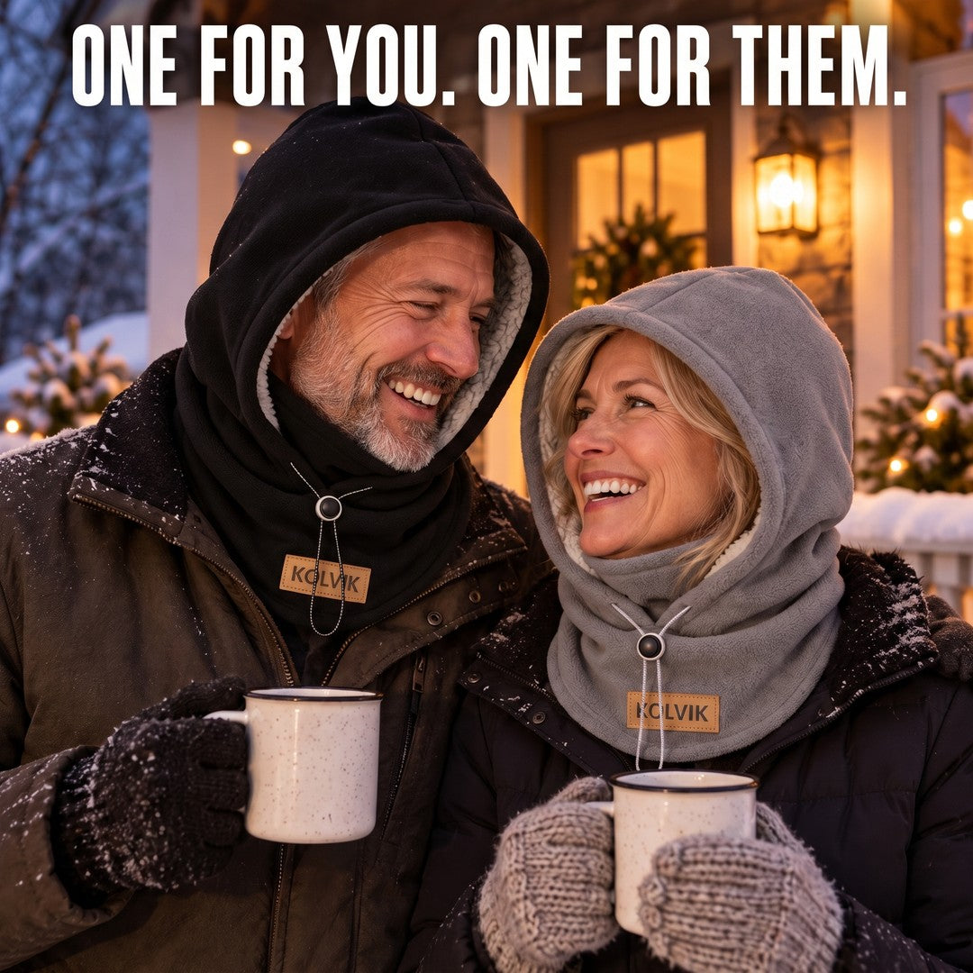 Couple on a snowy porch each wearing a Kolvik hood